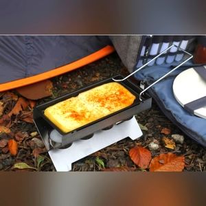 Nouvel H'eat Cheese Raclette Set. Enjoy hot bubbly cheese, cook with tea lights